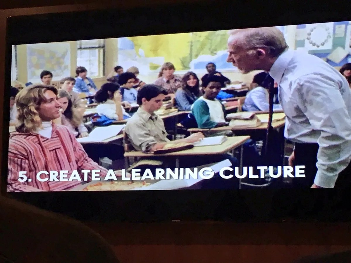 Film-still slide captioned &lsquo;5. Create a learning culture&rsquo; over a classroom scene.